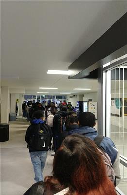 Students wait in the tardy line that stretches from the front doors to past the new Spartans Cafe on Jan. 16 The weather was  